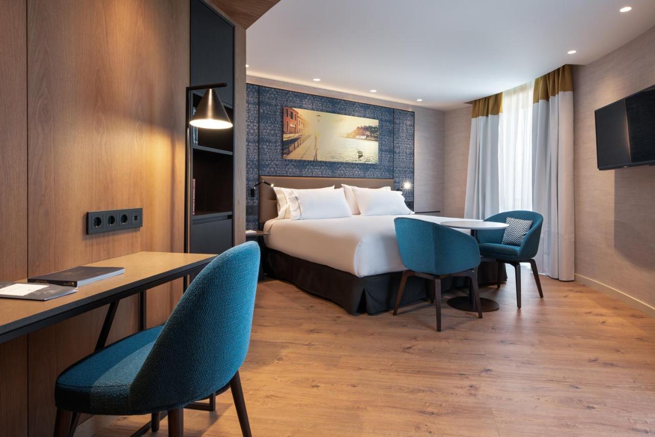 Eurostars Aliados Hotel Porto Ngoại thất bức ảnh A room at the hotel