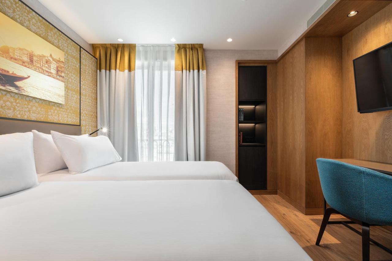 Eurostars Aliados Hotel Porto Ngoại thất bức ảnh A room at the hotel