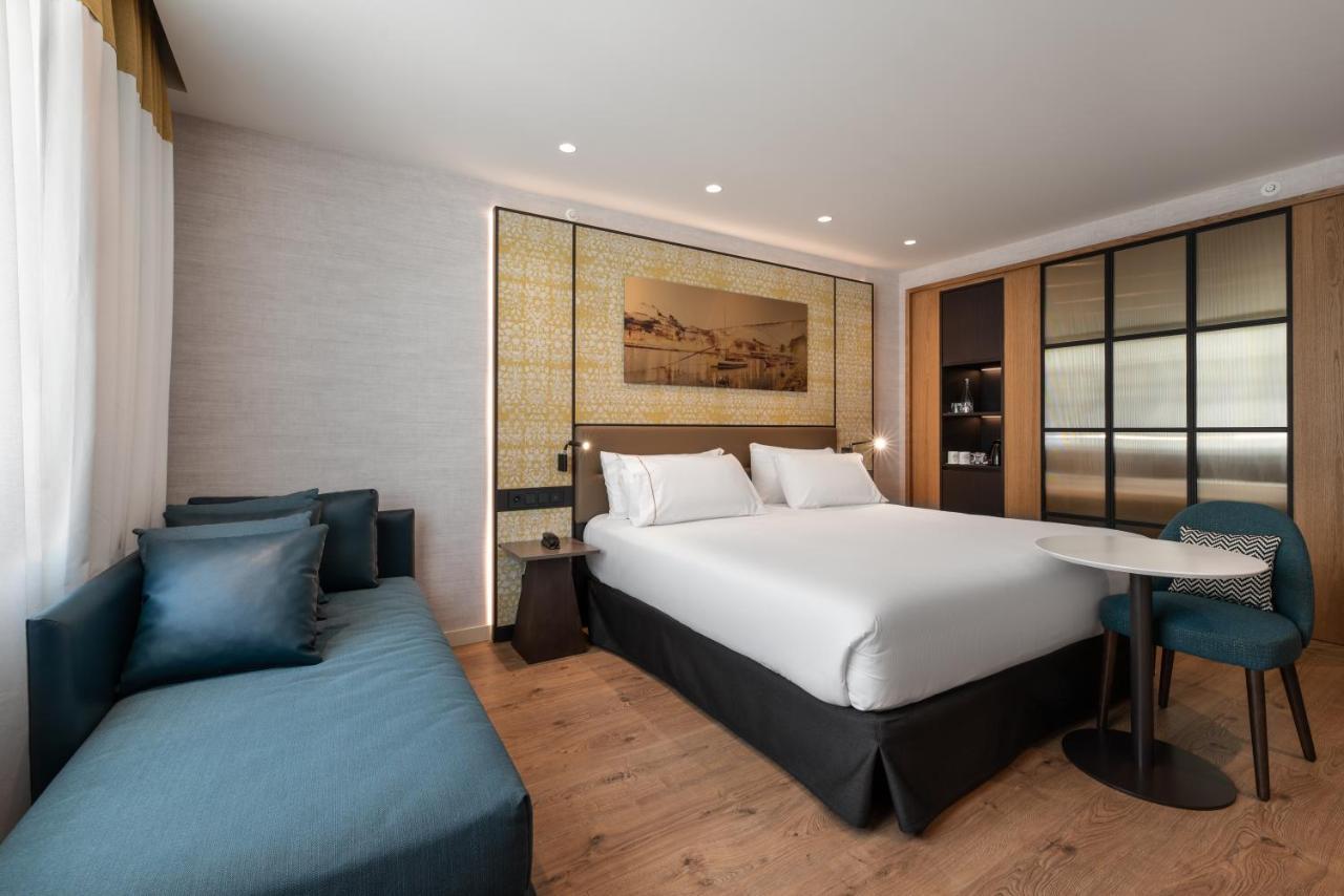 Eurostars Aliados Hotel Porto Ngoại thất bức ảnh A room at the hotel